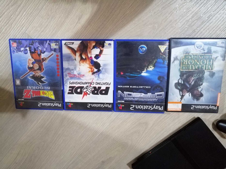 PS2 с един джойстик и 4 игри