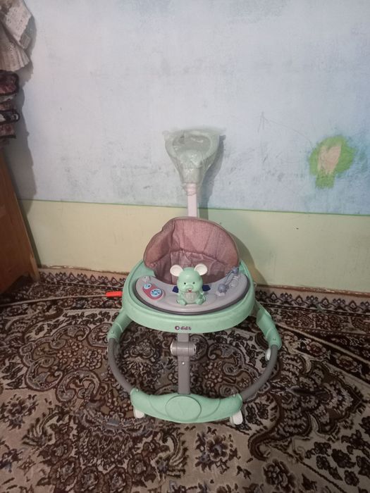 Детский ходунок новый
