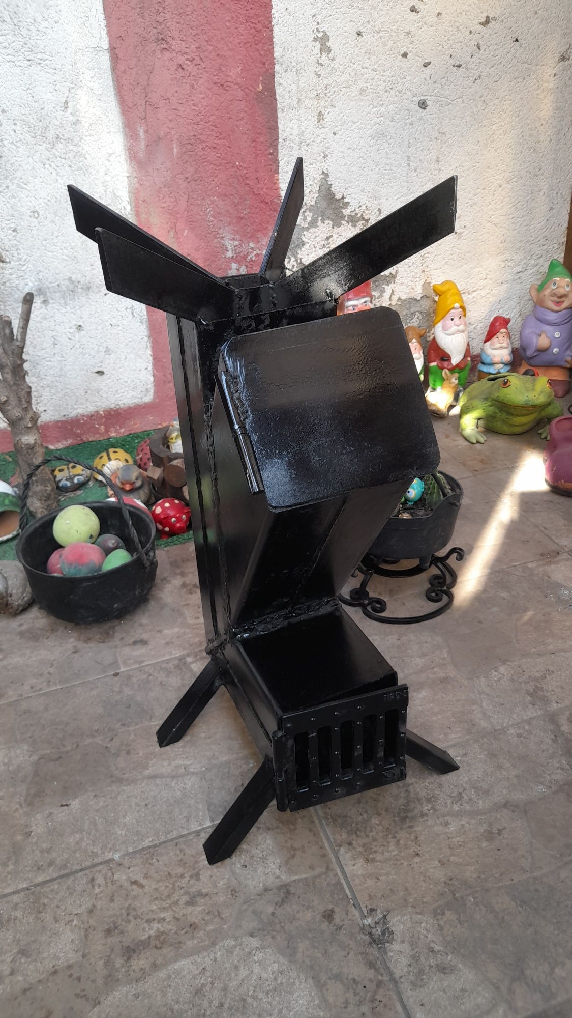 Sobă racheta pentru gatit la foc