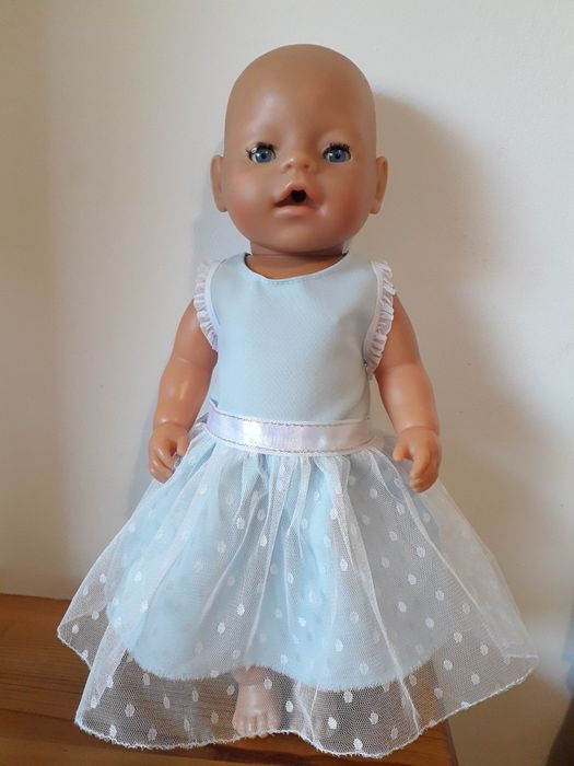 Много дрешки за кукла Бейби Борн/Baby Born 43см