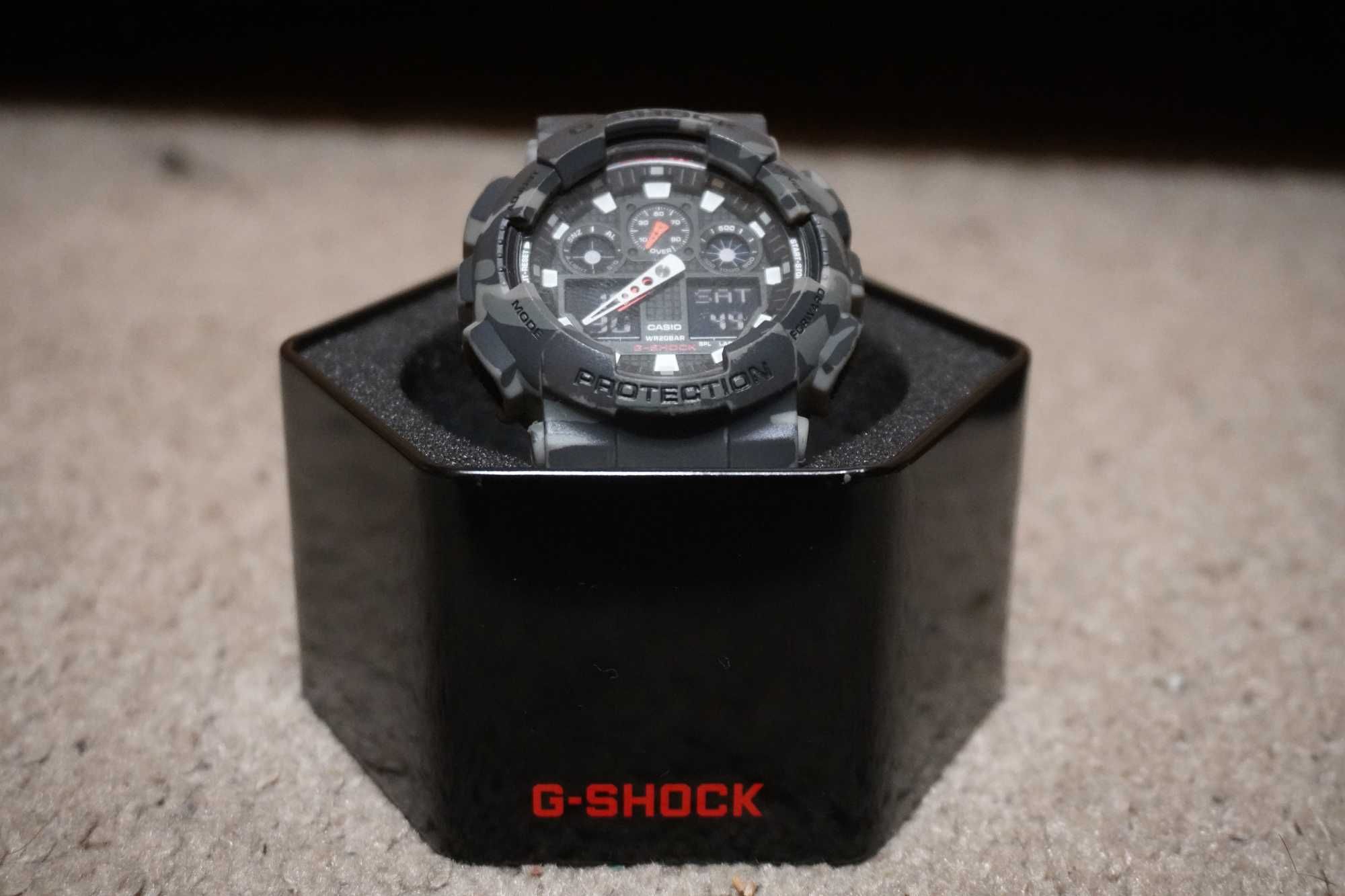 Casio G-Shock GA-100B Камуфлаж *Договаряне*