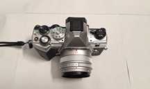 Vand
OM System OM-5 . 
Olympus om5
