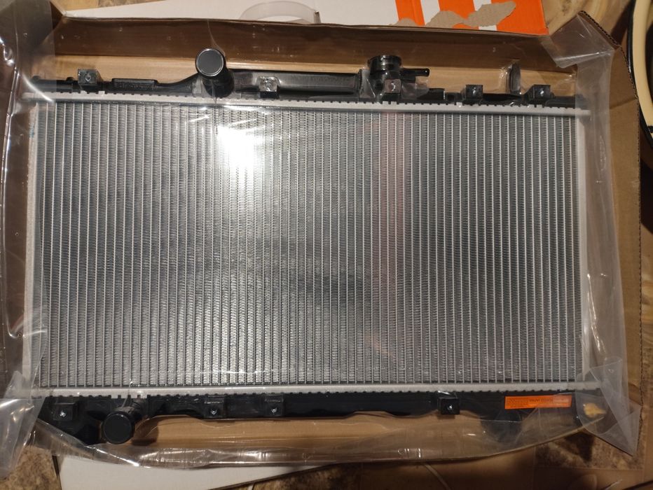 Радиатор охлаждения Карина Е,1.6