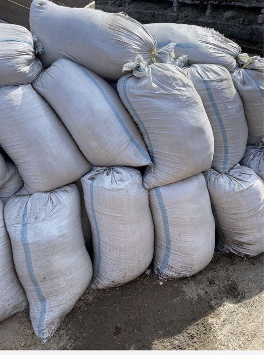 Продам мешки новые зеленые с синей полосой