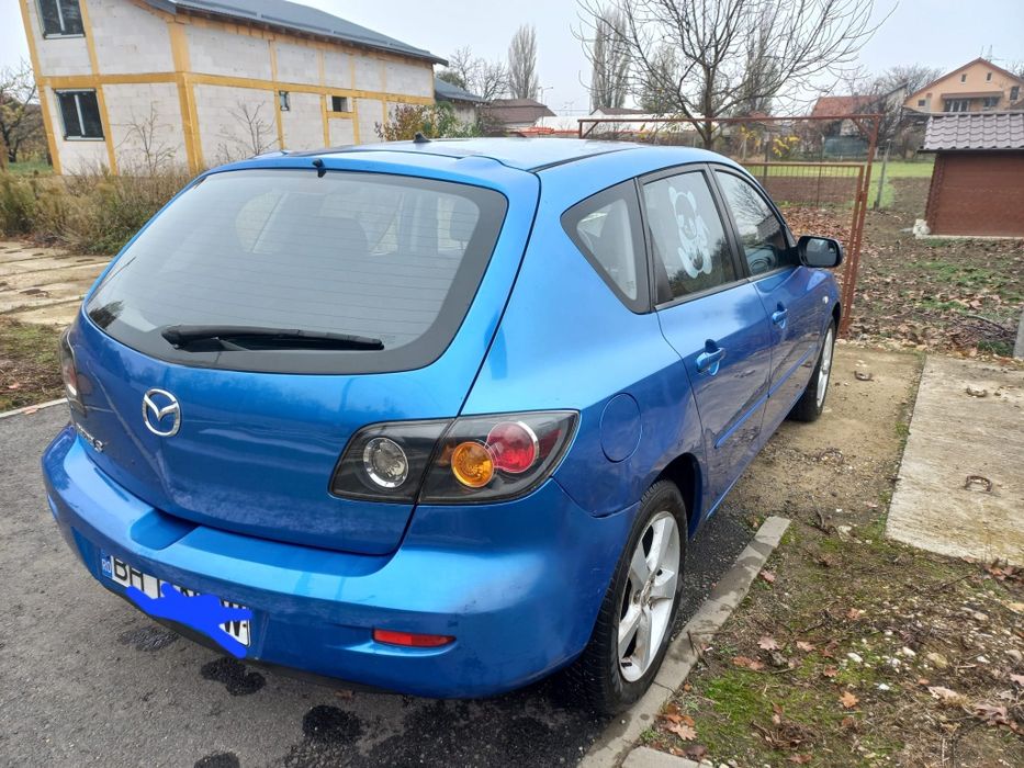 Vand masina Mazda 3