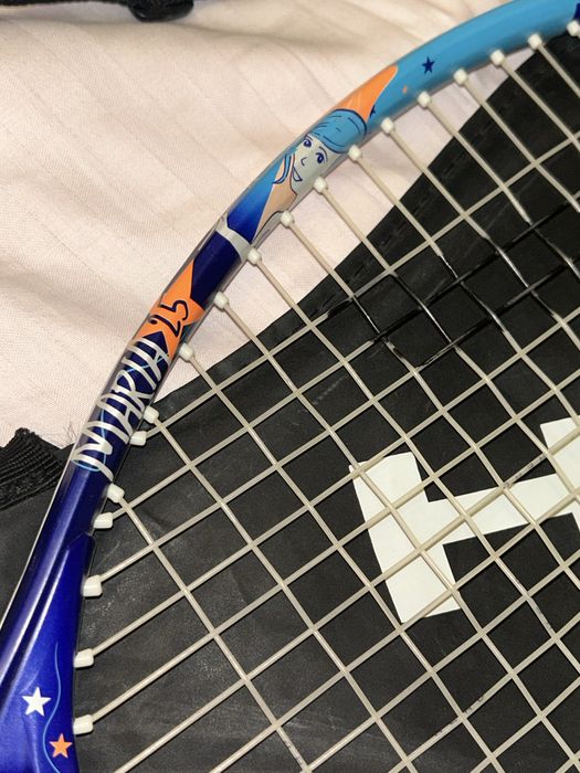 Теннисная ракетка