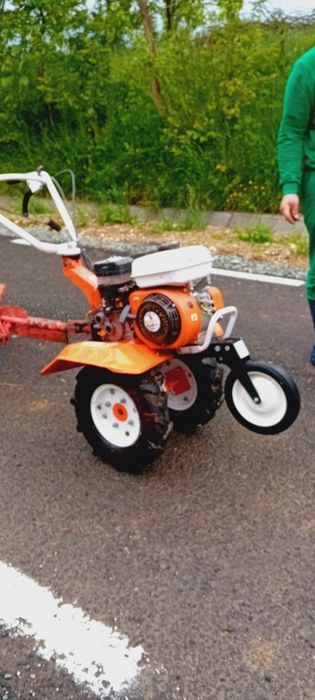 Motocultor cu remorcă și freză aproape nou