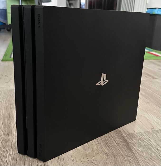 PS4 Pro 1 Tb + 2 controllere si 2 jocuri