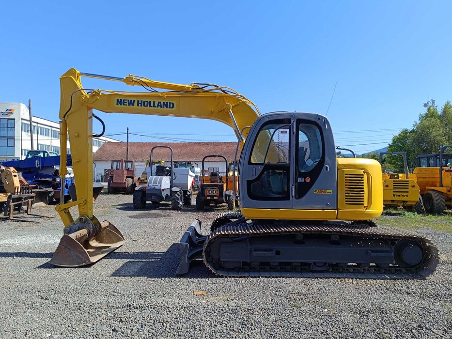 Excavator pe senile cu lama New Holland E135SR , 2009 , 14 tone