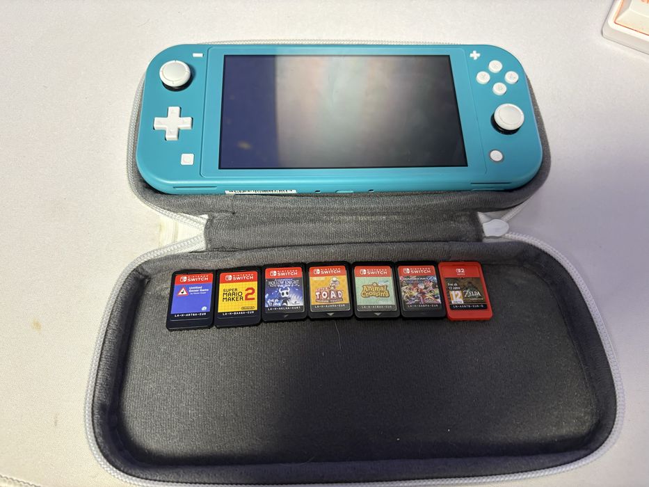 Nintendo Switch Lite +7 jocuri
