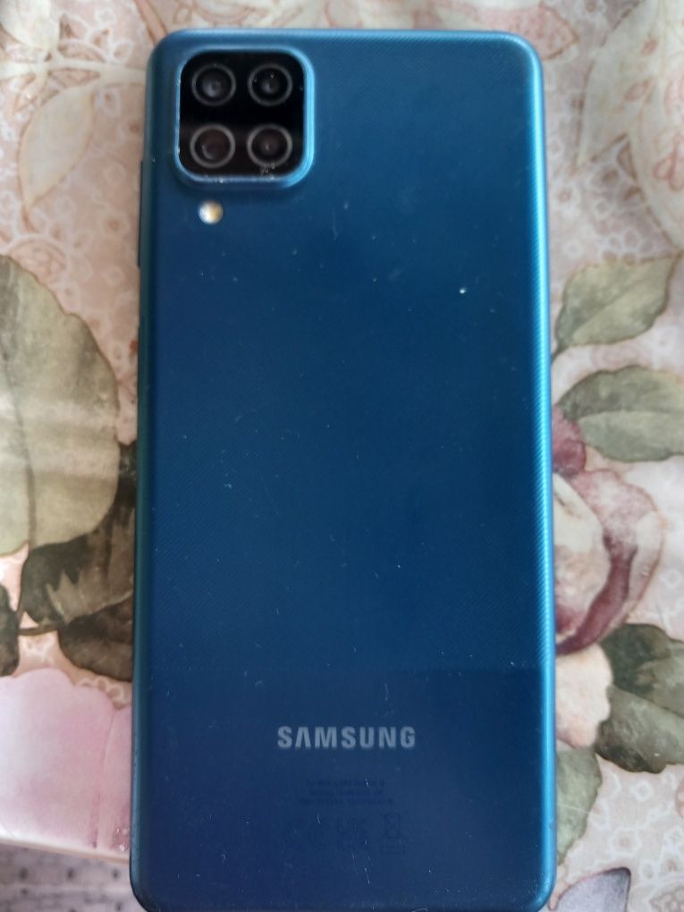 Телефон TCL 505.