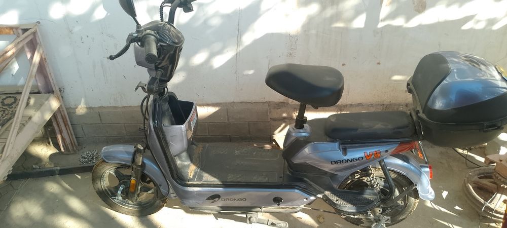 Электро мото ва  скутер