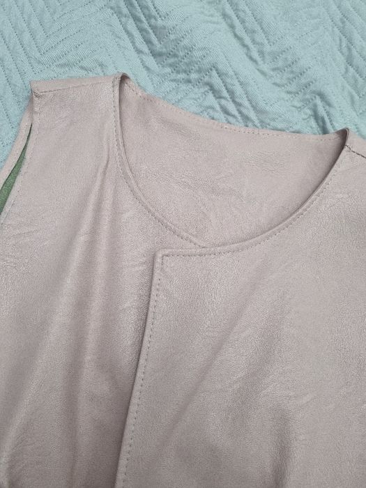Vestă   de   piele
