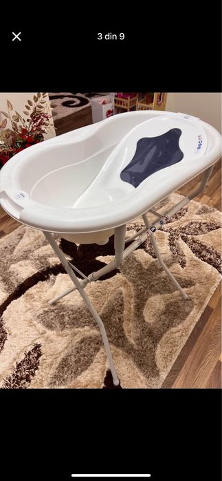 Cadita Rotho-babydesign cu suport inalt si reductor de dus