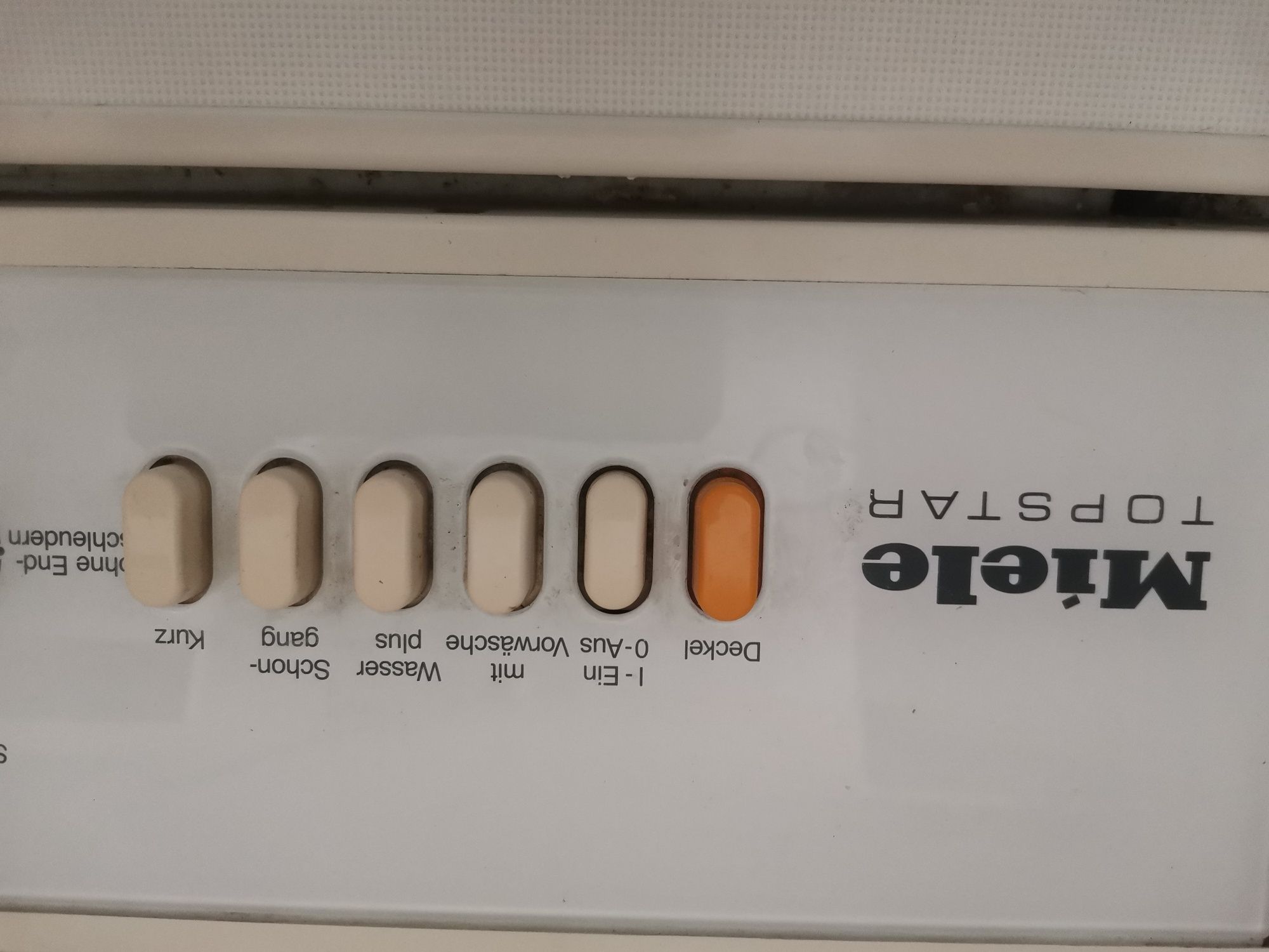 Пералня Miele 45 см с горно отваряне