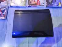 PS3 Super Slim + 2 Controllere originale și + 21 jocuri