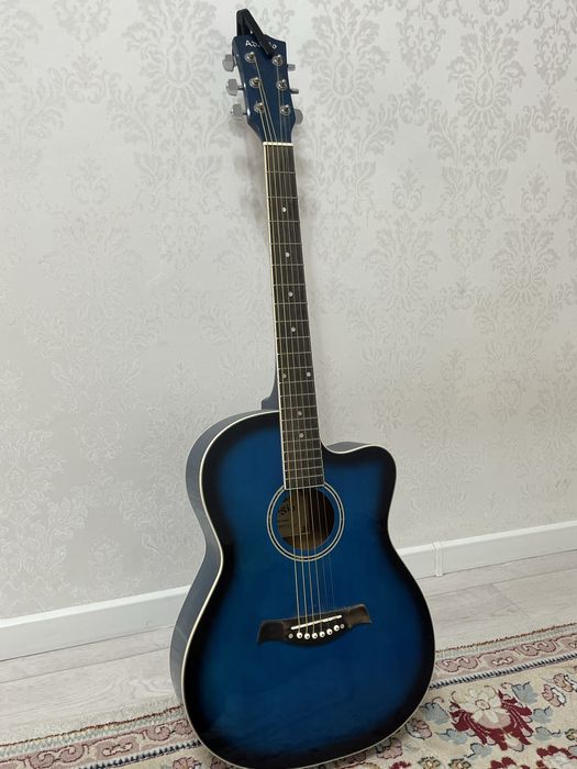 Гитара адасио в комплекте кападастер