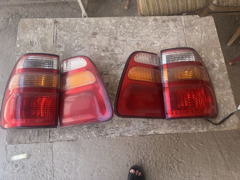 Toyota Land Cruiser 100 задний фар сборе Koito