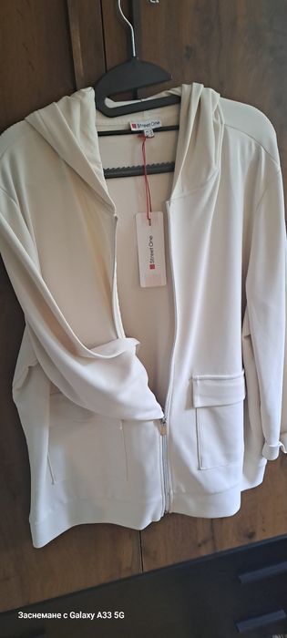 Нова Бяла,красива,елегантна жилетка,купена от Германия,не е носена