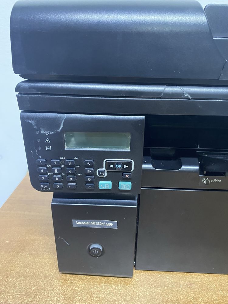 Multifunctionala HP M1212nf