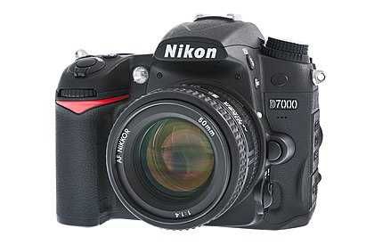 Nikon D7000 body+zoomer