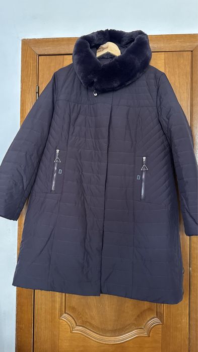 Продам новый  теплый пуховик 57/58 р