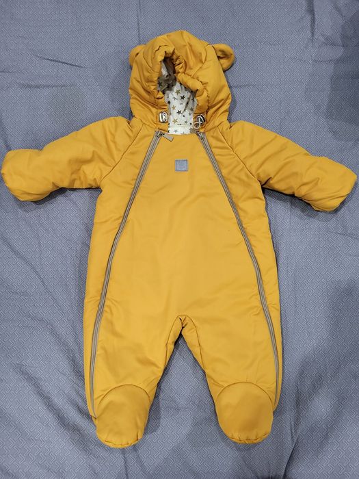 Продам димнесезонные комбинезоны.