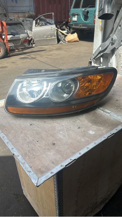 Левый фара Hyundai Santa Fe американец