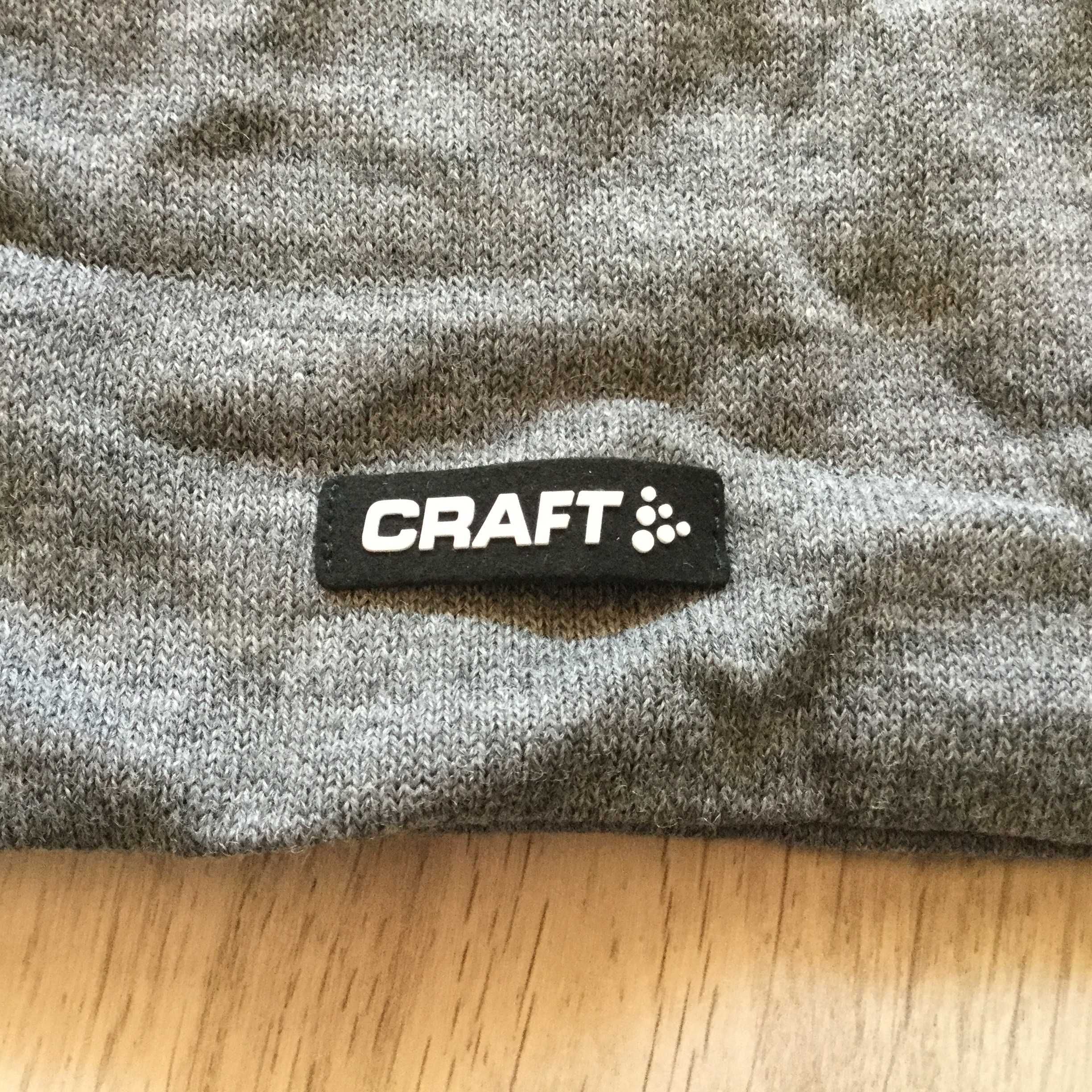 НОВА 100 % оригинална зимна плетена сива шапка CRAFT / Крафт за ски