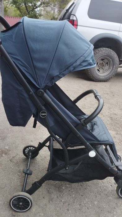 Продам детскую прогулочную коляску TOMIX