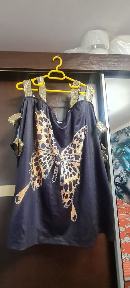 Vând rochița stil bluzița cu un design superb ocazie