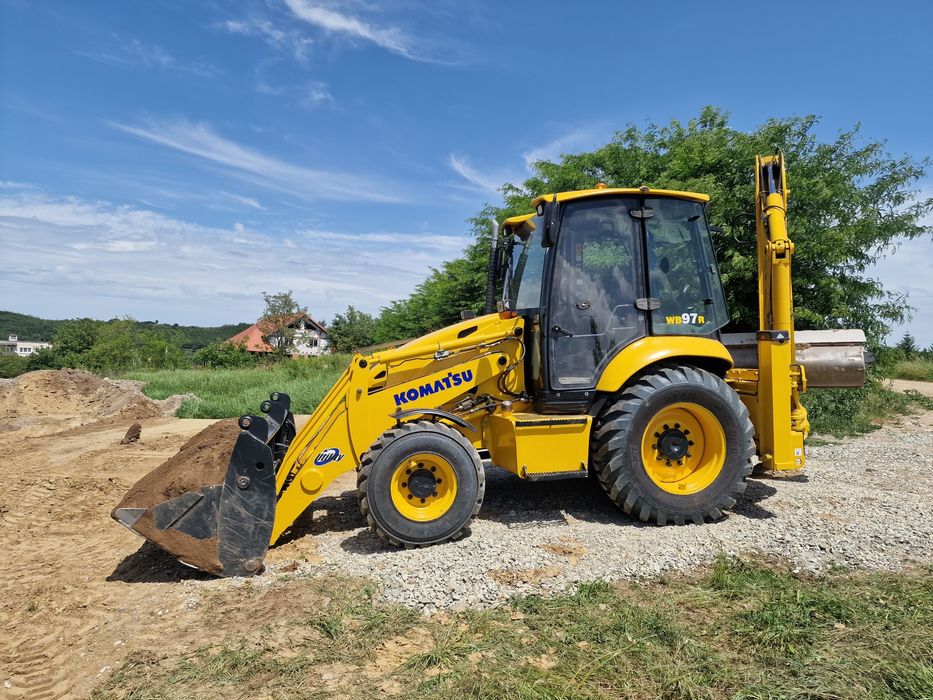 Buldoexcavator de inchiriat servicii buldo, cilindru compactor, excava