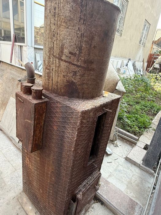 Железная печь-водогрейка