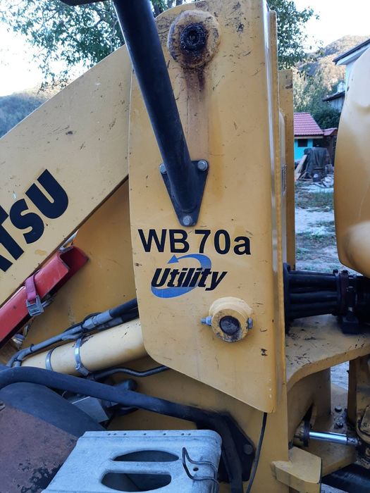 Багер Komatsu WB70A