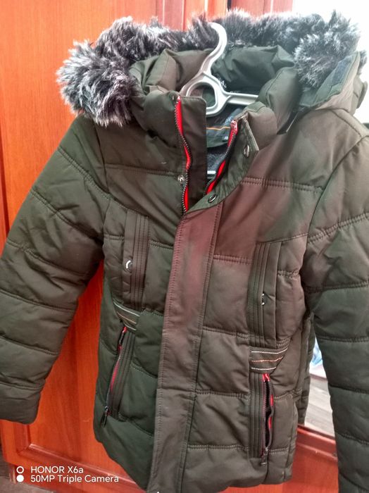 Куртка детская на мальчика 7-9лет, в отличном состоянии. Цвета хаки