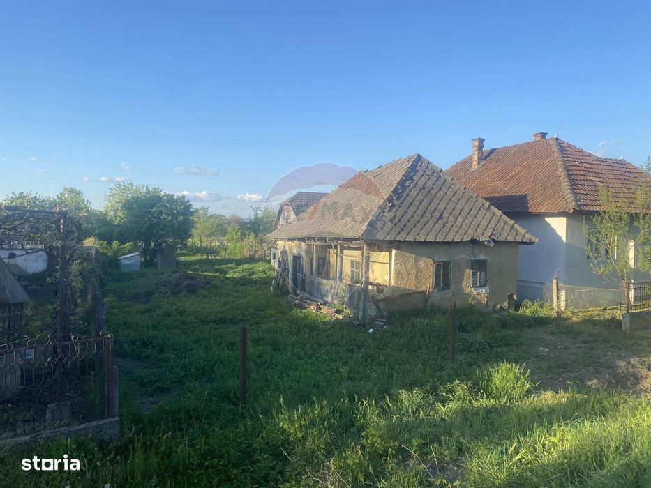 Casă cu teren 23 de ari de vânzare