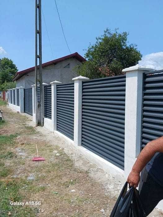 Construim la comanda dvs. garduri si porti din:
- panouri stil jaluzea