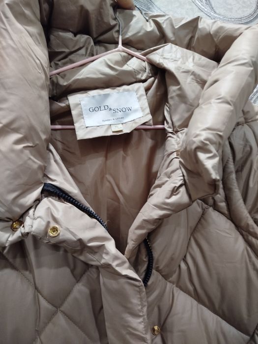 Женский пуховик.