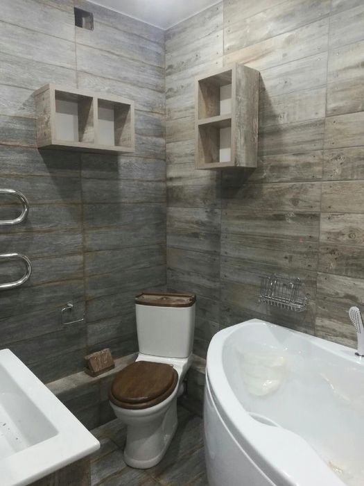 Укладка плитки, кафеля, керамагранит, вырезка углов под 45°