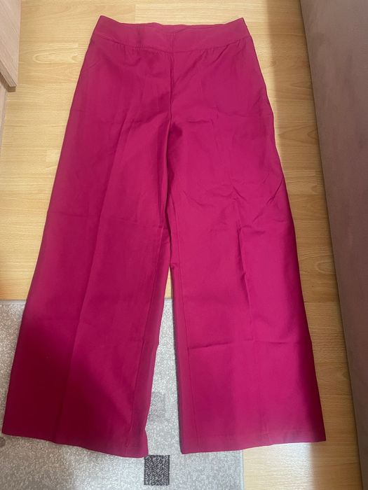 Pantaloni evazați