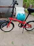 Bicicleta BTwin tilt 120 pliabila rosie