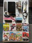 Wii Complet cu 2 manete 2 Nunchuck.  8 Jocuri.