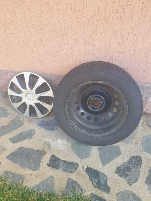 4 Jante Dacia Logan cu cauciucuri de iarna si capace