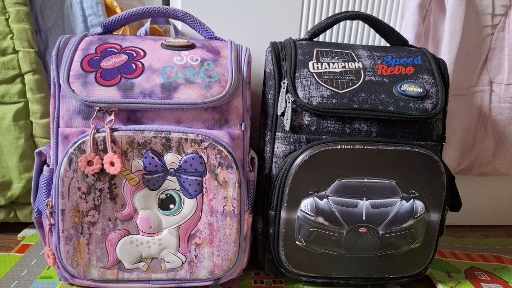 Продам портфели     для мальчика и девочки