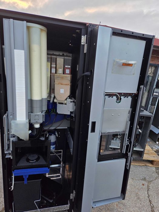 Automat Cafea Necta, Opera