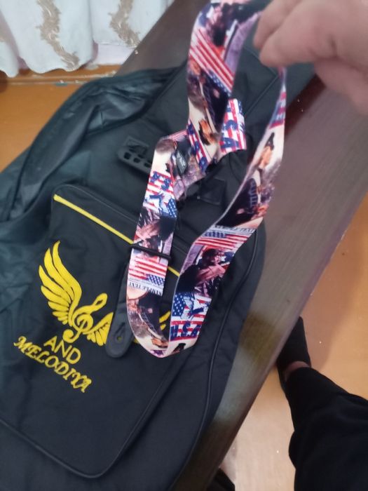 Gitara g'ilofi ilgichi ham bor