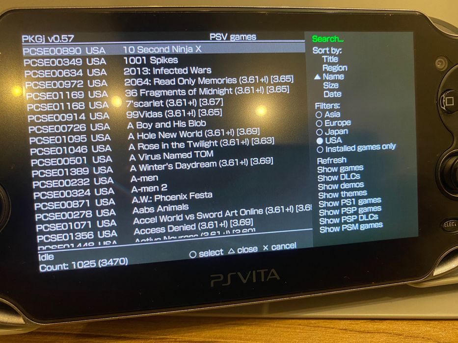 PlayStation Vita OLED (japoneză) modificată, cu jocuri