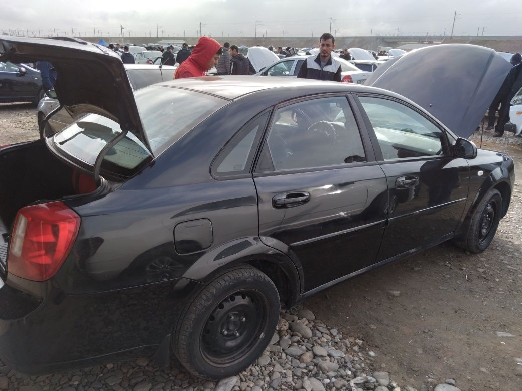 Lacetti 2011 avtomat motor 1.8 qora sotiladi