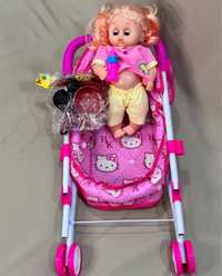 Детская игрушка «кукла в коляске»