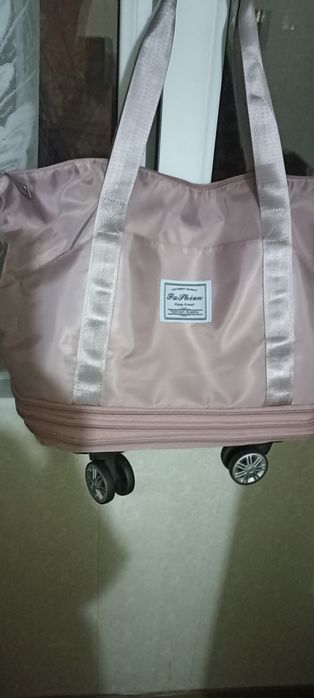 Сумка -трансформер новая высота 34 см, регулируется до 1 м  3 слоя.